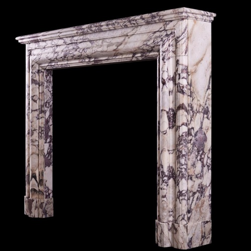 AN ENGLISH FIREPLACE IN BRECHE VIOLETTE MARBLE
