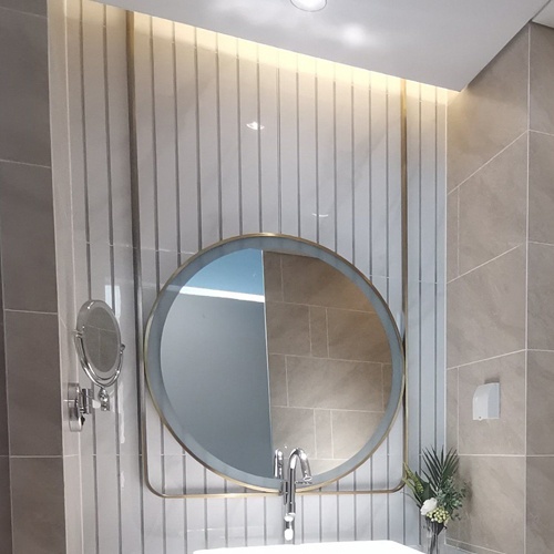 Ceiling mounted metal framed vanity mirror with LED lighting
