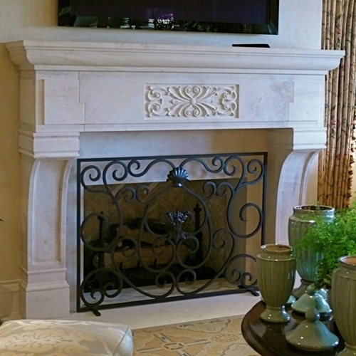 French provincial limestone fireplace mantels