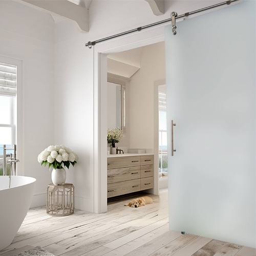 Glass barn door with acid etched or sandblasted frosted glass panel