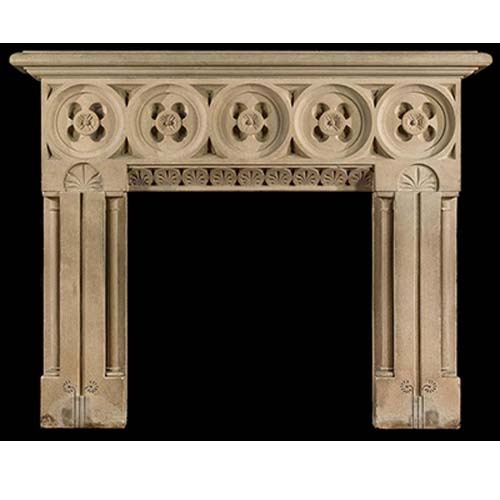 Gothic limestone fire surround with roundel frieze design