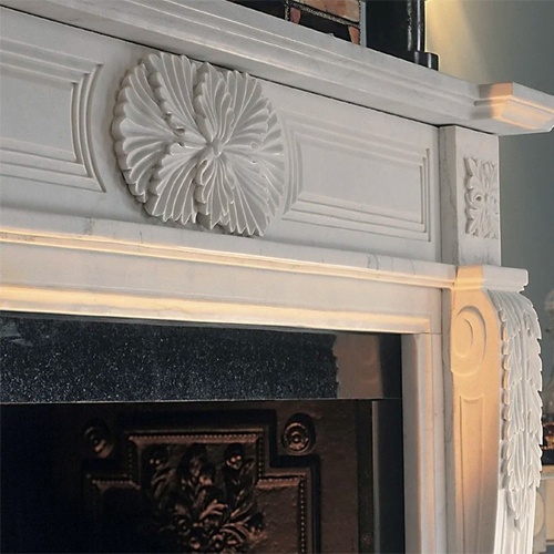 Imperial White marble fireplace surround with black granite slip and hearth