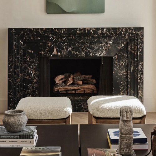 Minimalist marble fireplace enclosure by marble portoro gold