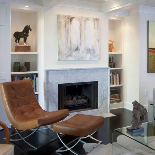 Modern white living room with a marble fireplace