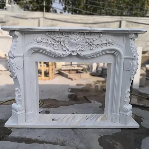White marble fireplace showcasing Rococo style