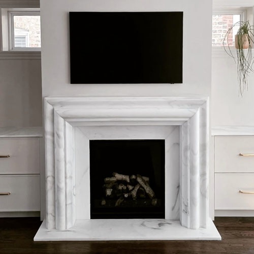 White marble fireplace surround Elizabeth Scott Design