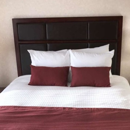 Wood Laminate Headboard with Attached Vinyl Pads