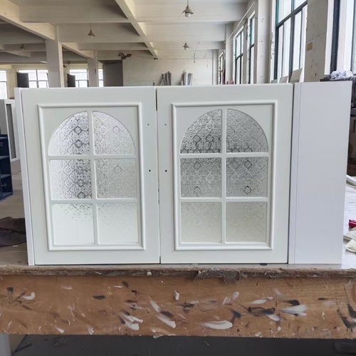 bathroom vanity cabinet door by floral textured glass insert