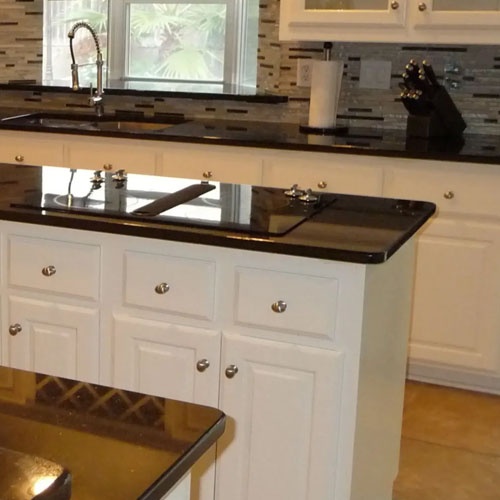black granite countertops with white cabinets