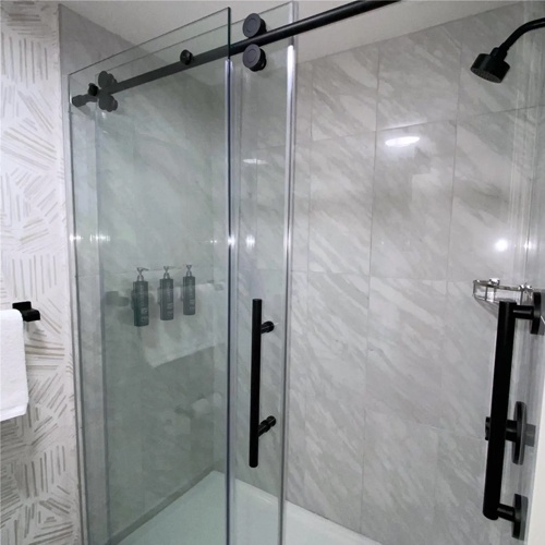 matte black frameless glass shower door for doubletree by hilton