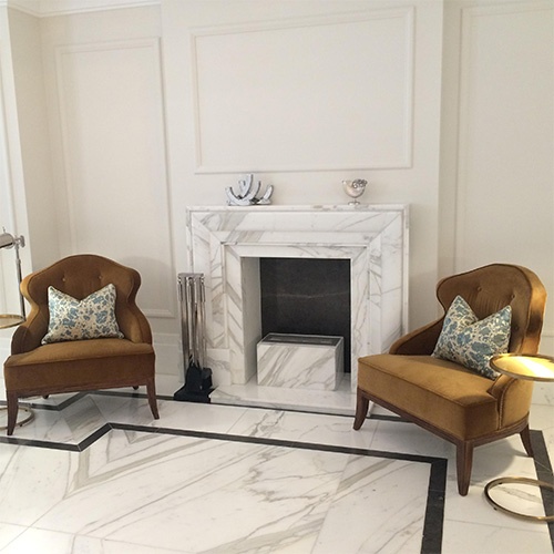 white marble fireplace mantel for boutique hotel lobby