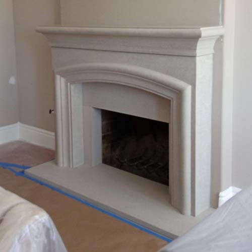 Compare marble and cast stone fireplace mantels