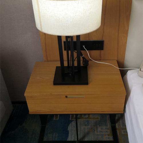 bedroom nightstand and table lamp