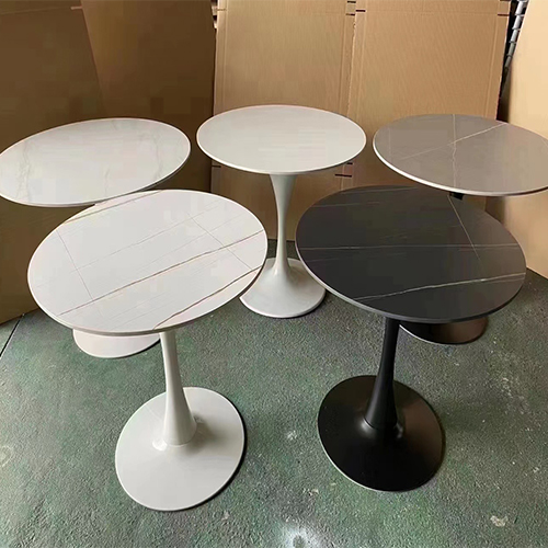 Table with metal base and artificial stone top 