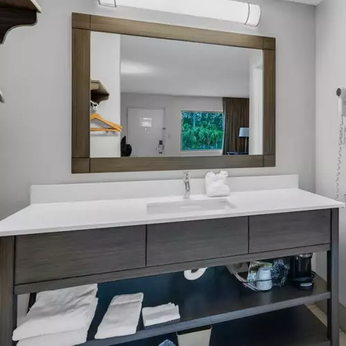 freestanding bath vanities and mirror for red roof inn