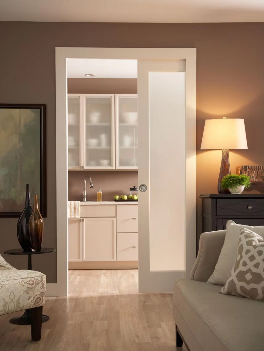 Interior glass pocket door with engineered wood stile and rail