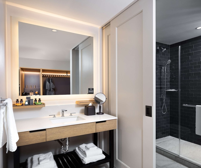 Shaker door for hotel bathroom