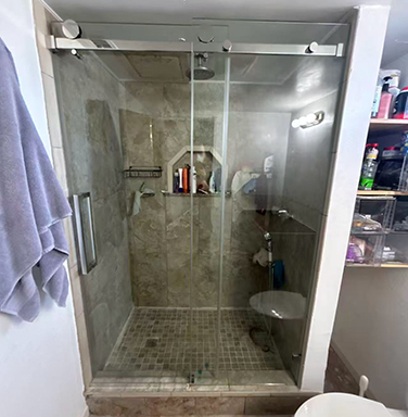 frameless barn door style glass shower door