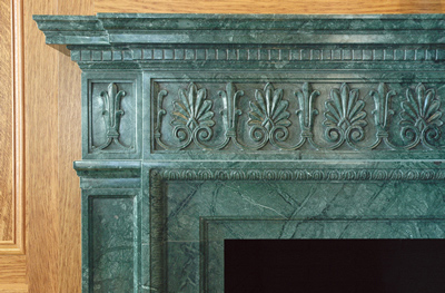 Greek palmetto leaves carving on marble fireplace mantel