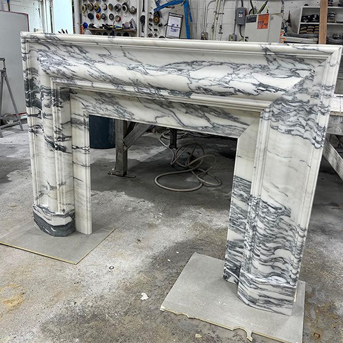 Prefabricated white marble fireplace mantel for new construction
