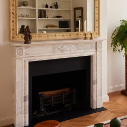 Apartment with marble fireplace from Architectural Digest