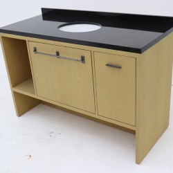 Bathroom wood vanity cabinet with absolute black granite tops and backsplash