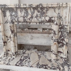 Bolection marble fireplace mantel crafted from natural stone
