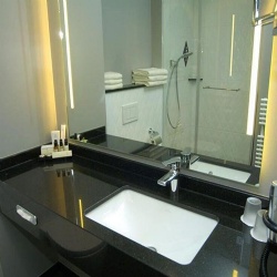 Can Granite Countertops Be Custom Cut for Hotel Vanities