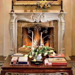 Carved marble fireplace mantel in living room