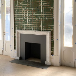 Contemporary bolection fireplace for the library