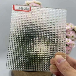 Crystal patterned pressed textured glass sample