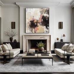 Decorative Artwork Over Marble Fireplace Mantel