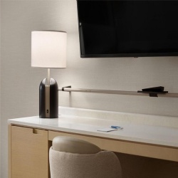 Desk with minifridge cabinet and quartz top in Delta hotel