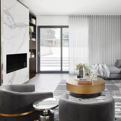 Floor to ceiling marble fireplace surround