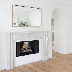 Marble fireplace mantel and wall mirror