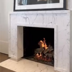 Marble fireplace mantel for hotel guestroom