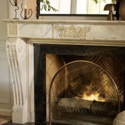 Marble fireplace mantel with floral carving