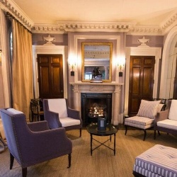 Ornate marble fireplace for boutique hotel