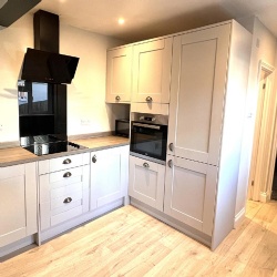 Shaker Kitchen Cabinetry and Pantry for Apartment