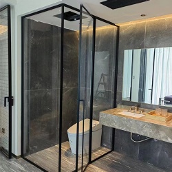 Shower Room by Glass Panel and Door in Hotel Bathroom