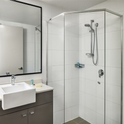Shower room glass and vanity mirror for Meriton Suites