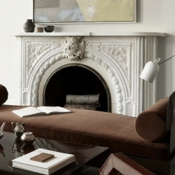 Stylish marble fireplace mantel in vogue living