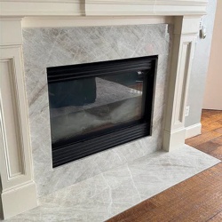 Taj Mahal Quartzite fireplace installation Project in Dallas Texas