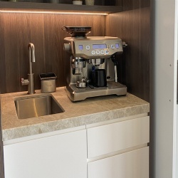 Taj Mahal quartzite wet bar countertop in apartment and hotel guestroom