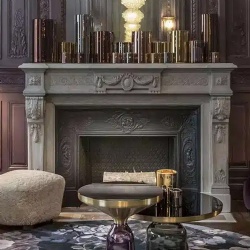 Traditional marble fireplace mantel in luxury boutique hotel in Bordeaux