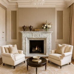 artisan carved stone fireplace mantel