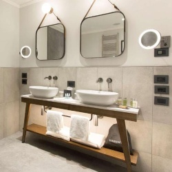 bathroom vanity and fixture in doubletree by hilton rome