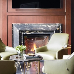 black honed Belvedere granite fireplace surround