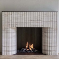 contemporary marble fireplace mantel with ribbed fluted and reeded details