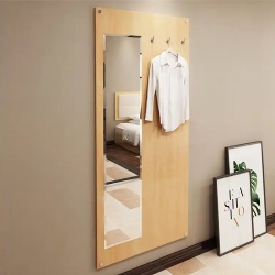 dresser mirror and hook on wooden wall board